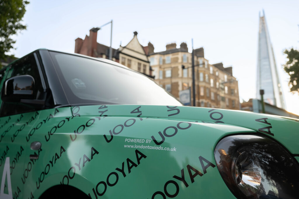 Taxi advertising in London for uooya on london black cabs by London taxi adverts